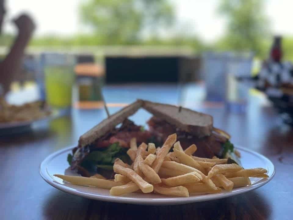 Club sandwich and fries served at Max's on the Green